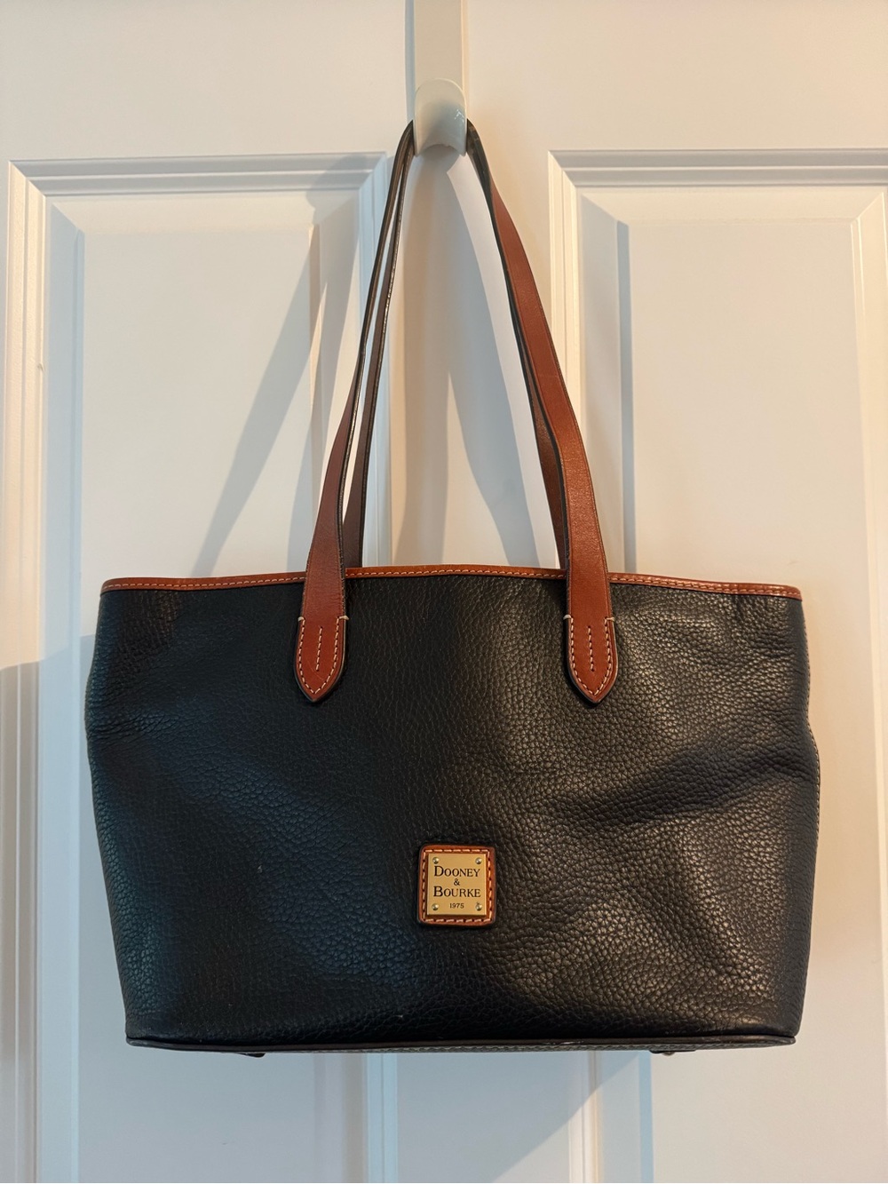 Dooney & Bourke Black Pebbled Leather Tote with Brown Trim and Straps